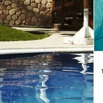 Pool water beside a stone courtyard